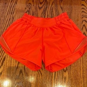Red lulu lemon running shorts! Lightly used.